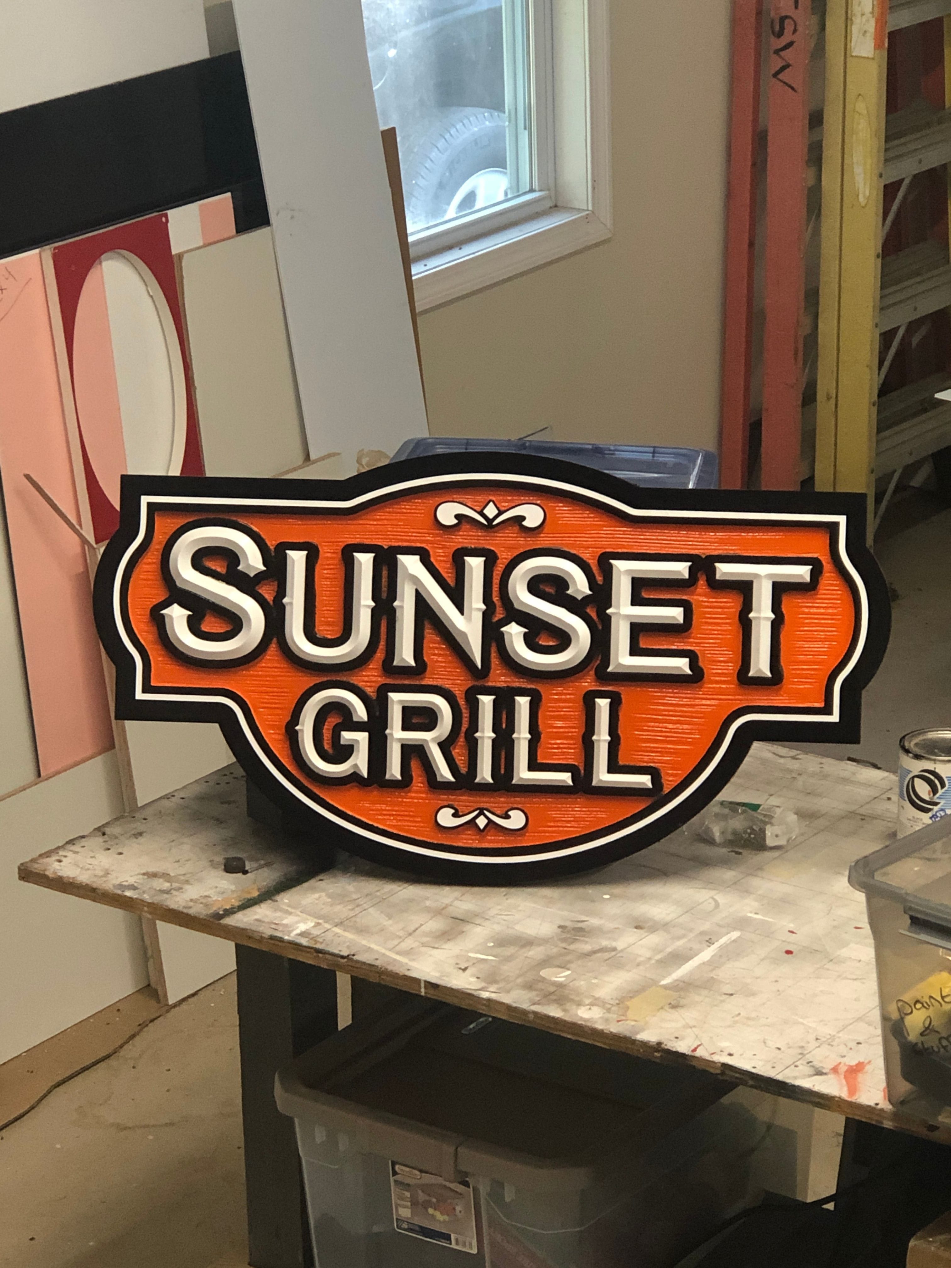 ROUTED DIMENSIONAL SIGN WITH ADDITIONAL APPLIQUE LETTERS FOR MORE POP!